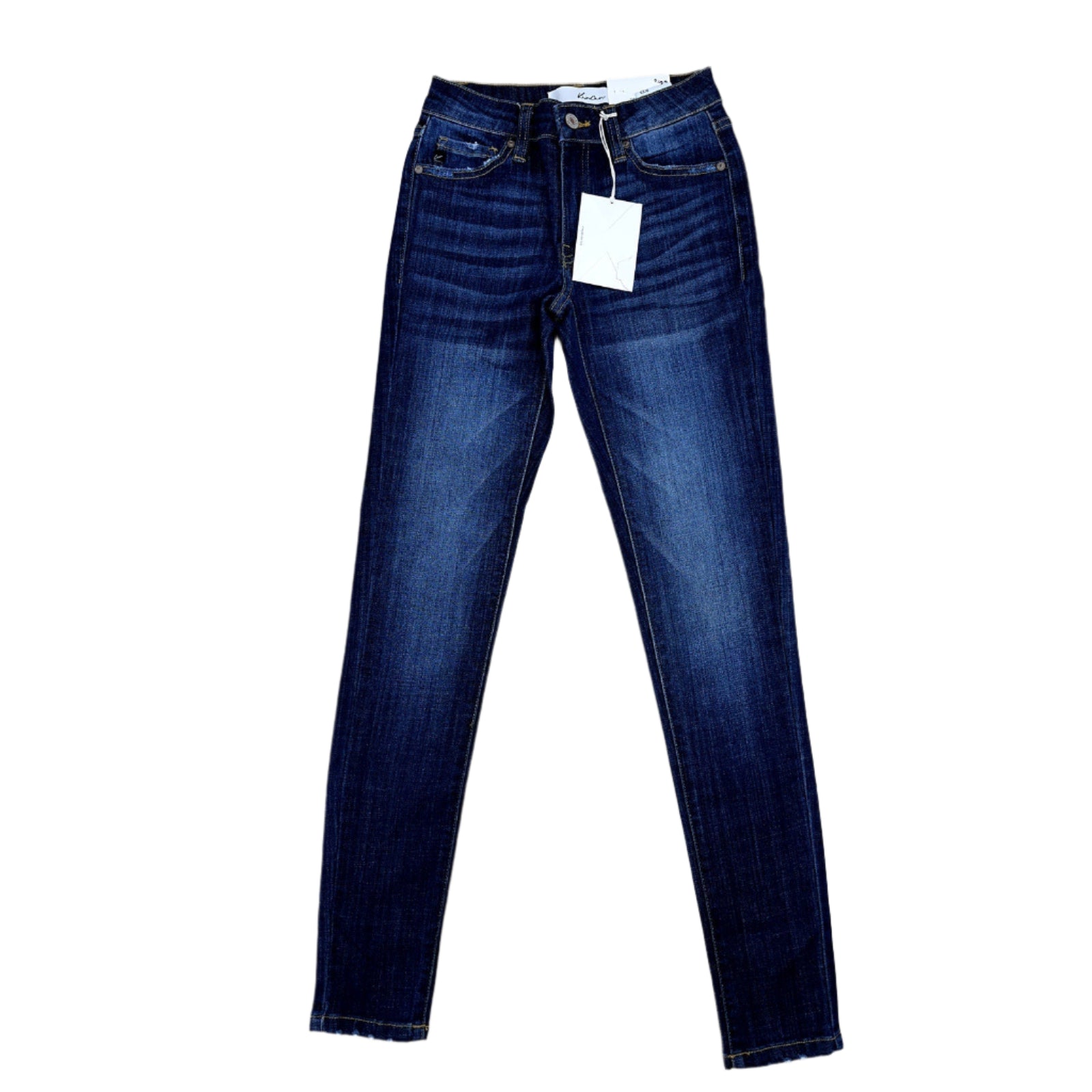 Pair of blue jeans on a wooden surface with a measuring tape for scale.