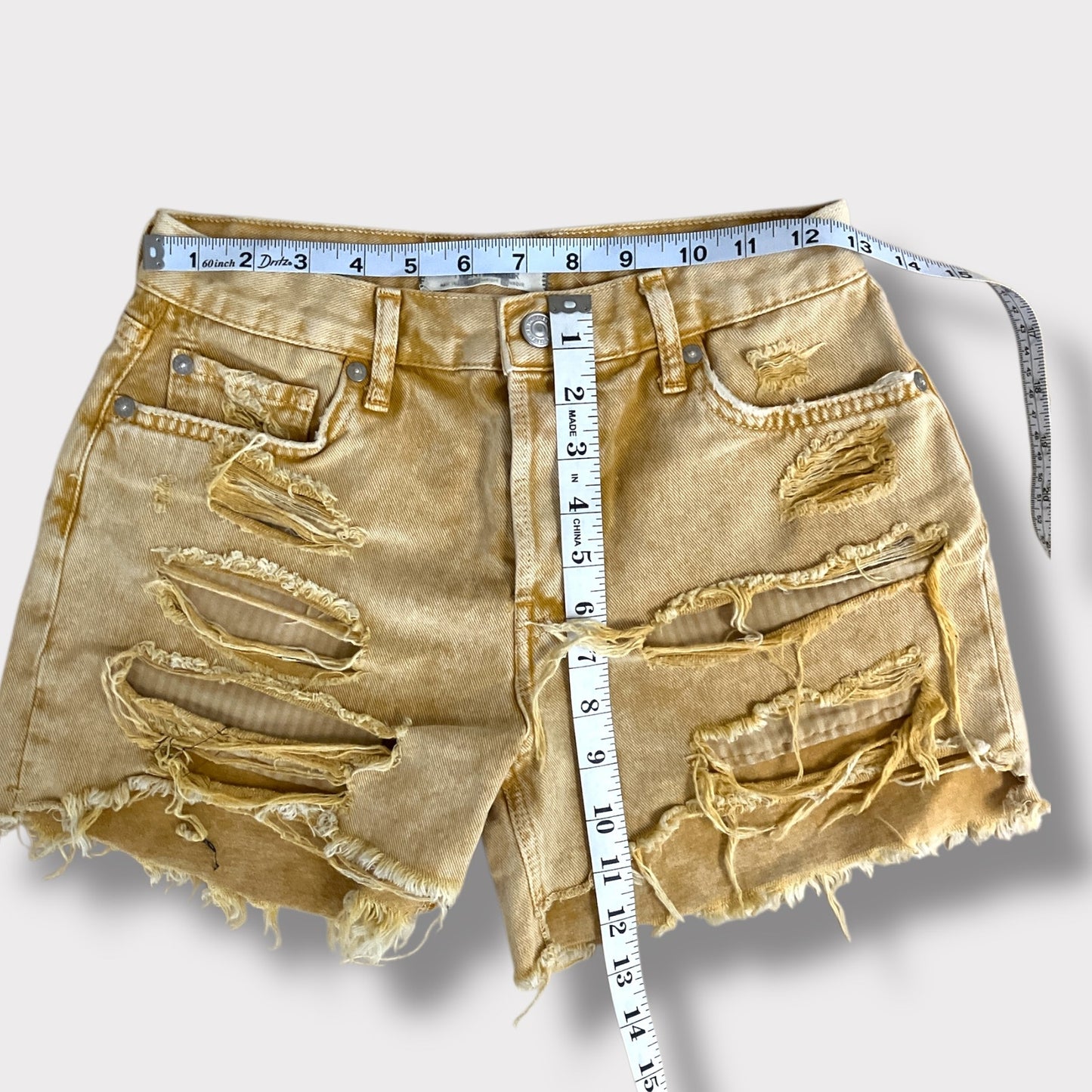 We The Free Free People Mineral Wash Distressed Mustard Hight rise short 24